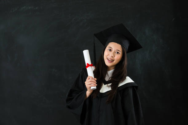 istock portrait of beautiful smiley graduate student 823541422