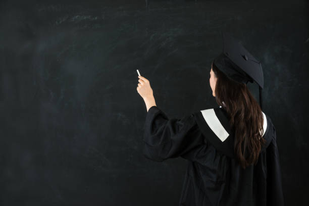 istock portrait of long hair back student using chalk 823541458