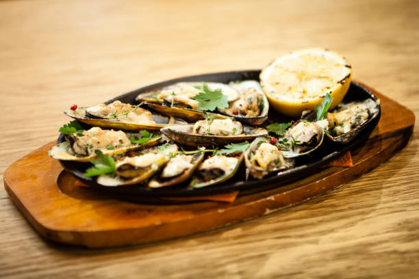 istock Baked mussels with cheese 823547484