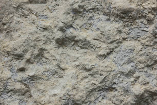 istock Texture of a stone wall for a designer 823547650
