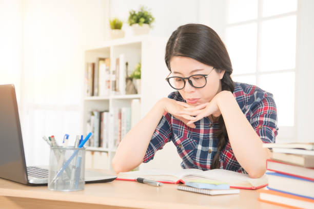 istock sad student searching on laptop 823548960