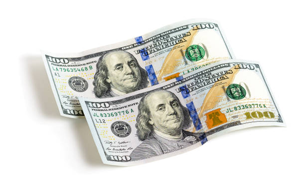 istock One hundred dollars banknotes isolated on white background 823549110
