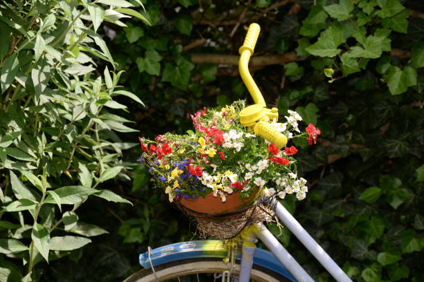 istock Yellow bicycle with flower decoration 823573320