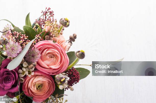 Bouquet Of Flowers In Tin Mug On Light Background Stock Photo - Download Image Now - Bouquet, Flower, Modern