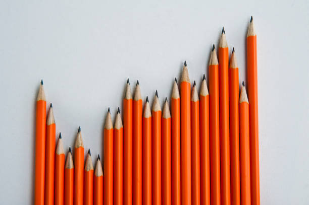 Concept illustration with Gaussian chart made of black carbon pencils. 3d illustration.