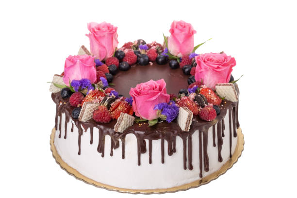 istock Chocolate cake with fruits and flowers. 823606876