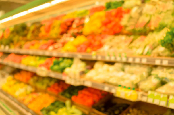 istock Abstract blur store shelves with fruit for background. 823607524