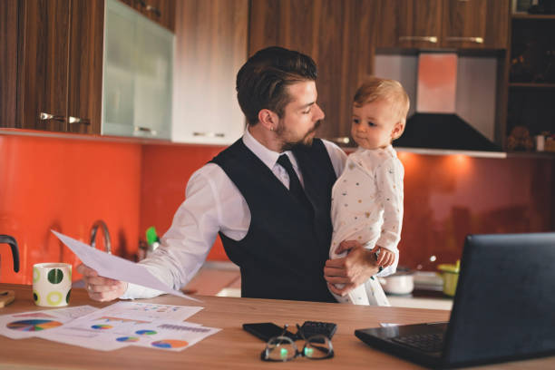 istock Businessman and baby boy 823619958