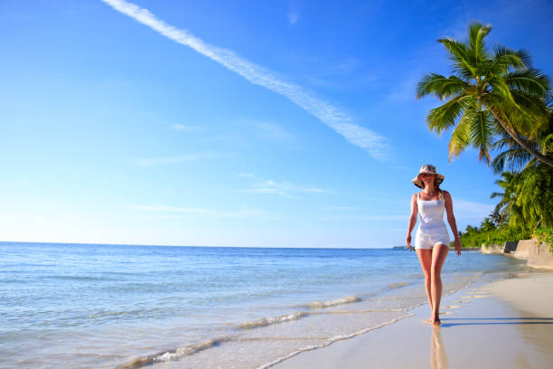istock Dreamscape Escape with beauty girl on Maldives 823620018