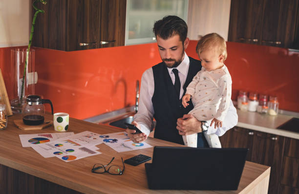 istock Busy father texting on the phone 823620122