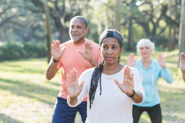 istock African-American woman taking tai chi class 823634738