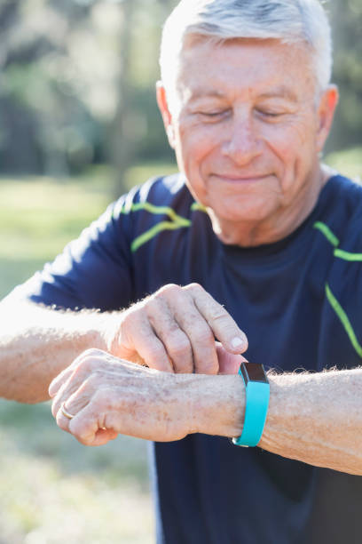 istock Senior man in his 70s using fitness tracker 823634908