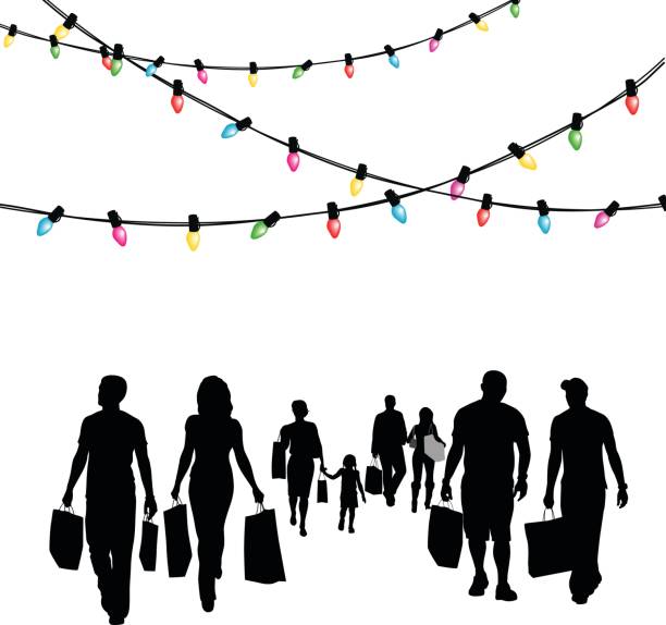 Festive Shopping Deals A vector silhouette illustration of a gropup of christmas shoppers carrying shopping bags below strands of christmas lights. gift silhouettes stock illustrations