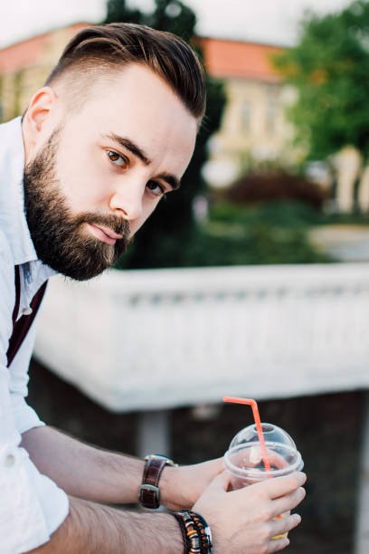 istock Enjoying smoothie in the city 823643194