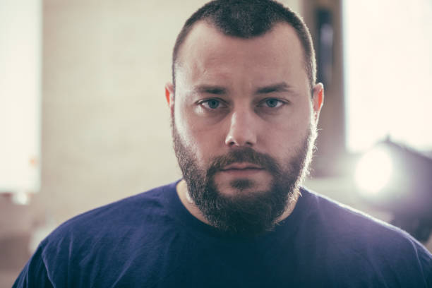 Portrait of a bearded man indoors