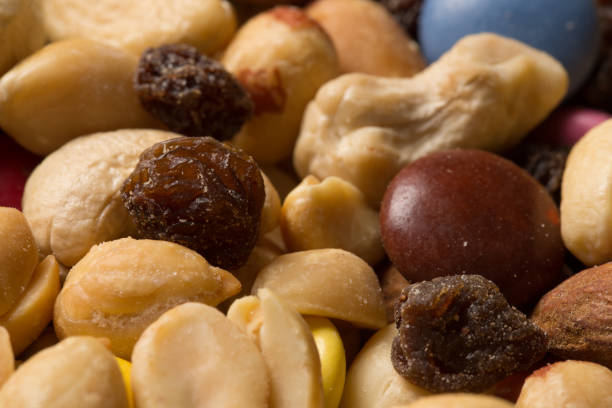 istock Pile of trailmix (nuts, raisins and candy) 823647318