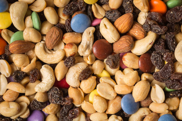istock Pile of trailmix (nuts, raisins and candy) 823647712