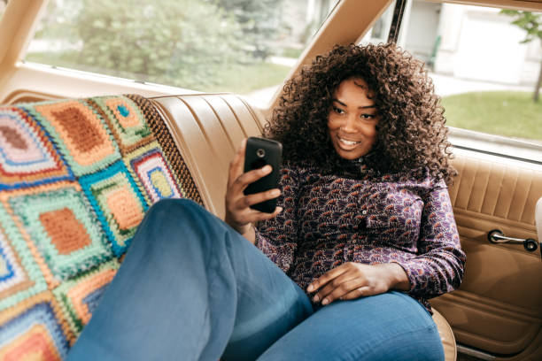 istock Smiling lady with cell phone 823648218
