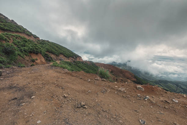 istock mud stone road in mist under motion blur in mountain 823655216
