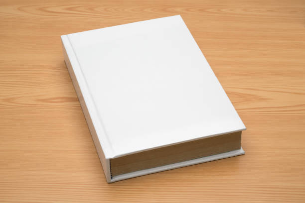 istock Mock up book on wood background 823662182