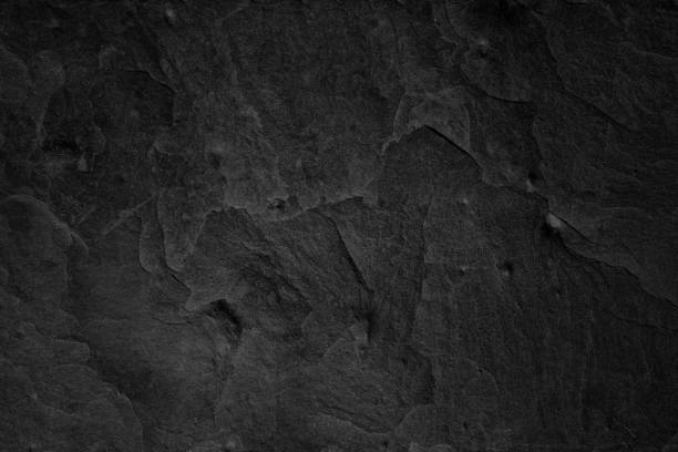 istock Dark grey black slate background or natural stone texture. 823664640