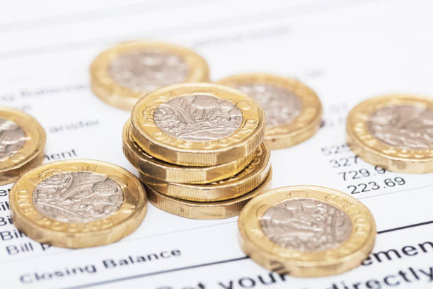 Pound - different british coin on table