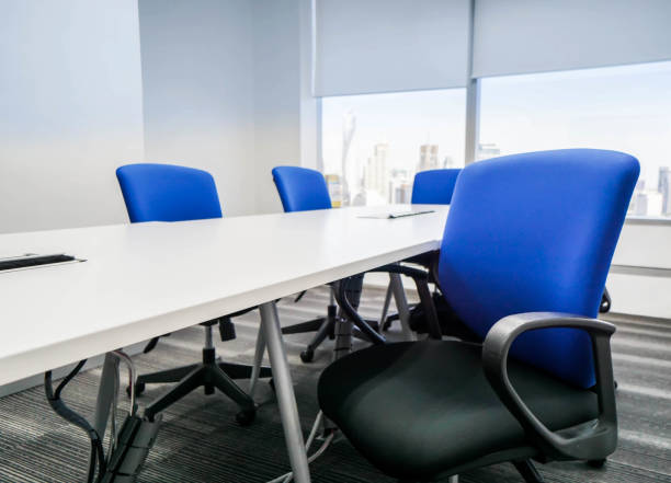 blue office chair with backrest in meeting room for seating stock photo