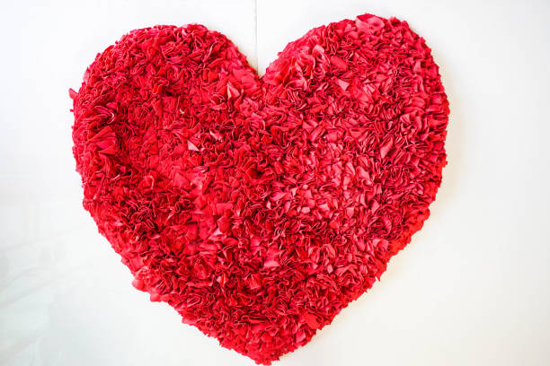 istock isolated bright red cloth carpet in heart shape 823679656