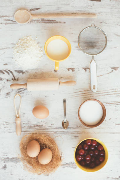 istock Cherries and kitchen utensils - knolling 823690264