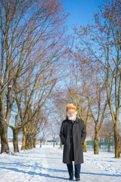 istock Senior with white beard, Kuchma and glasses in Park 823708324