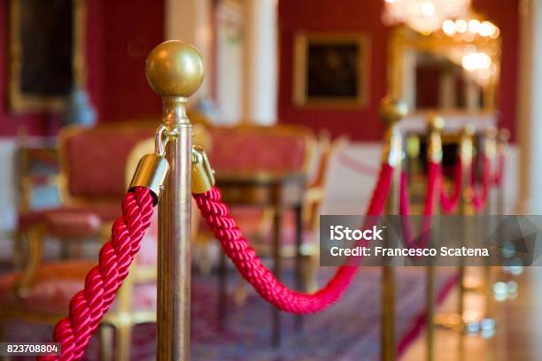 Detail Of Red Rope On A Exhibition Space Defocused Background Concept Image Stock Photo - Download Image Now