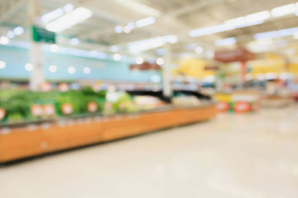 supermarket blur background Fruits and vegetables on shelves in supermarket blur background produce section stock pictures, royalty-free photos & images