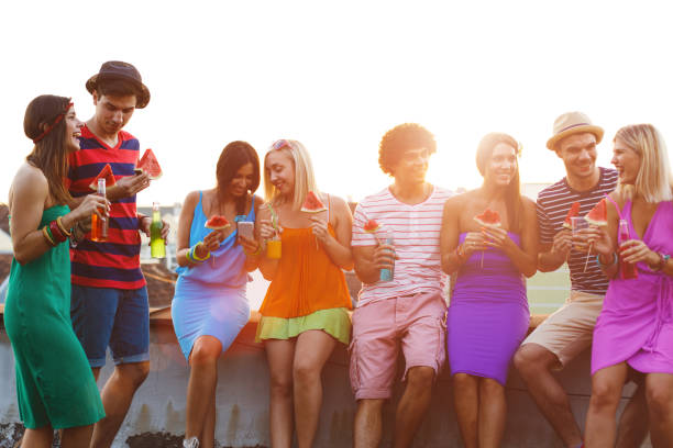 istock Young people enjoying a rooftop party 823712832