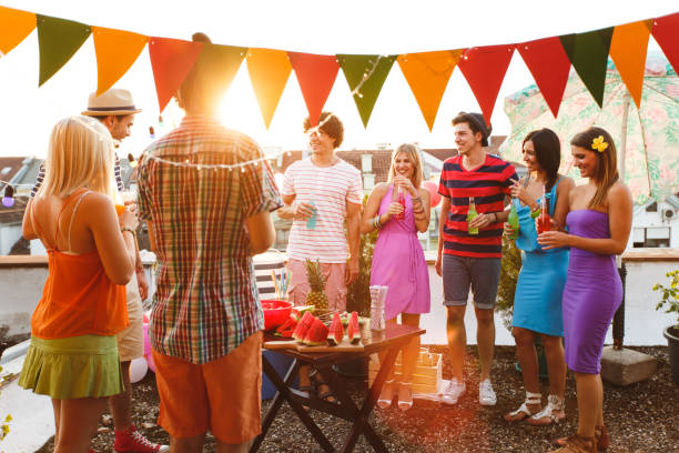 istock Friends enjoying urban rooftop party 823713166