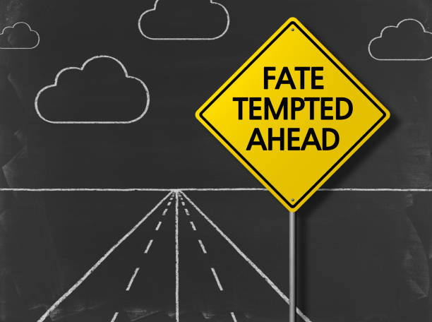 istock FATE TEMPTED AHEAD - Business Chalkboard Background 823715828