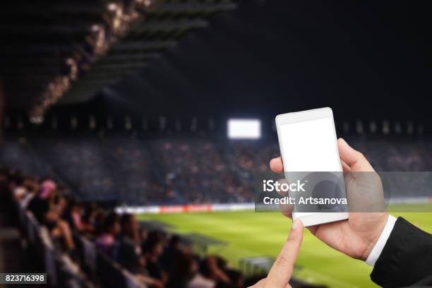 Hand Hold Mobile Stock Photo - Download Image Now - Soccer, Stadium, Soccer Ball