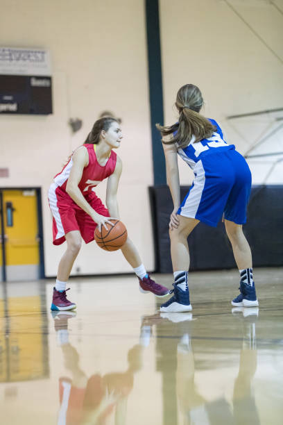 istock Girls high school basketball game 823719246