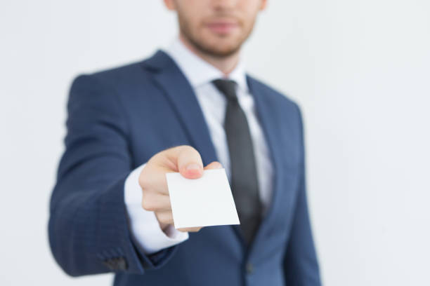 istock Young financial advisor giving business card 823722664