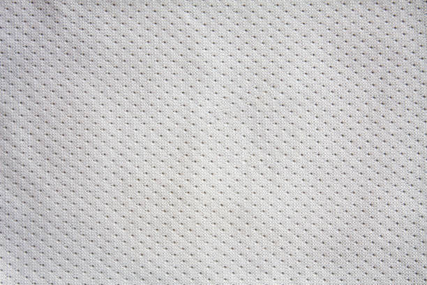 White sports clothing fabric jersey White sports clothing fabric jersey texture sports jersey stock pictures, royalty-free photos & images