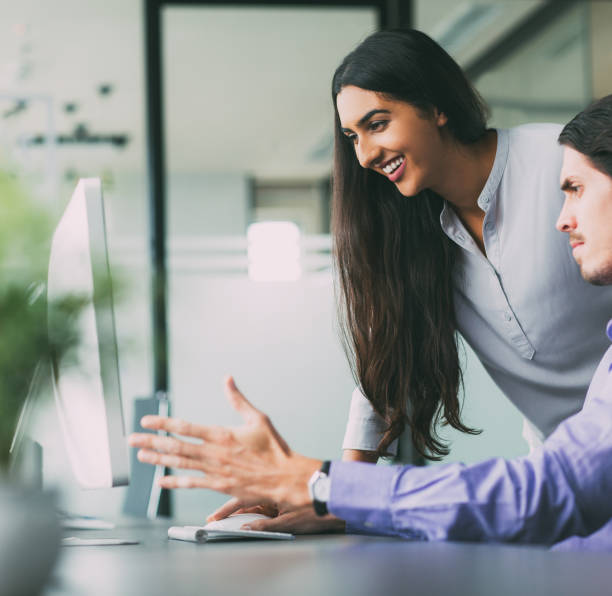 istock Two Focused Business Colleagues Discussing Ideas 823736532