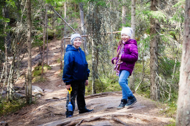 istock Children walk through the woods in Finland 823738284