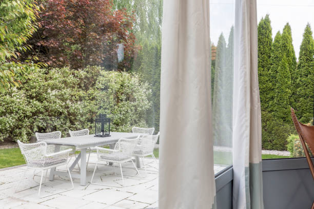 istock Garden terrace with furnitures 823740908