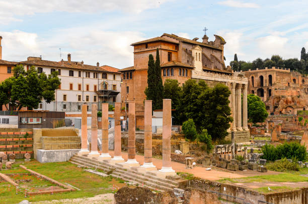 istock Roman Forum in the evening, a rectangular forum surrounded by the ruins of several important ancient government buildings at the center of the city of Rome. 823743712