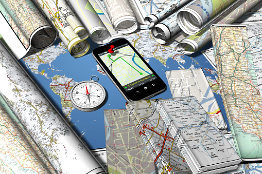 Smartphone with navigator application. Maps and road maps.