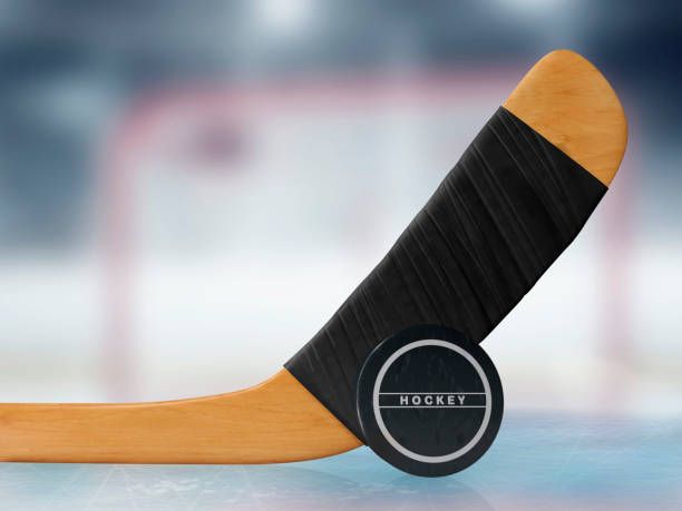 istock Hockey Stick and Puck 823759506