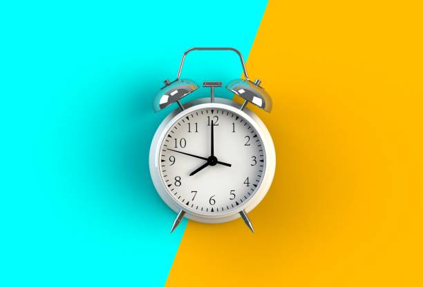 istock Alarm clock on blue and yellow background, 3D rendering 823760068