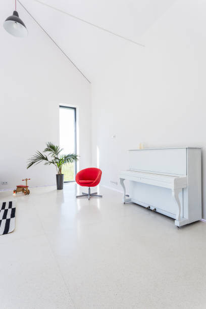 istock White living room with piano 823768016