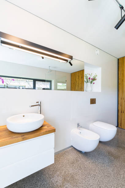 istock White bathroom with wooden details 823768062