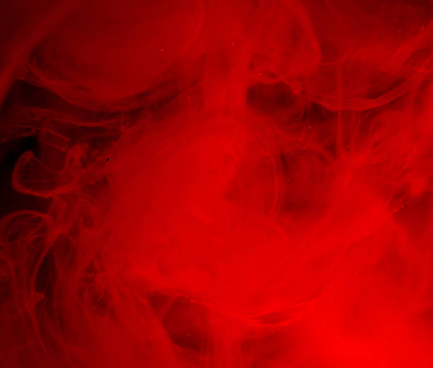 istock red ink in water isolated on white background 823775058