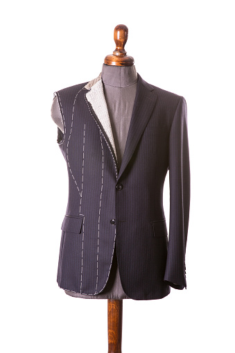 Work in Progress Suit without sleeve on Mannequin with Exposed Stitching isolayed on white background